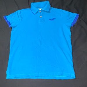 Blue men's Hollister polo shirt